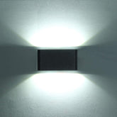 Rectangular wall light fixture on a white wall