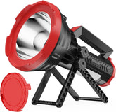 Red and black portable spotlight with adjustable stand on a white background
