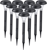 Set of 10 solar-powered outdoor lights with black spikes on a white background