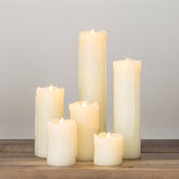 Set of 6 skinny real wax LED pillar candles