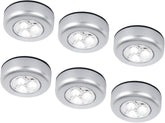 Set of six round silver LED lights on a white background