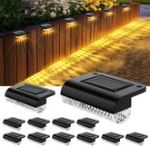 Solar-powered outdoor lights on a wooden fence with a clear background