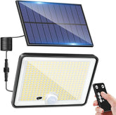 Solar panel, LED light panel, and remote control on a white background