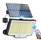 Solar wall light with solar panel, LED lights, and remote control on a white background