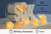 String lights shaped like seashells with battery and timer functions displayed.