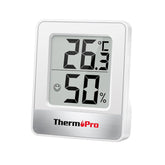 Thermometer and humidity meter with digital display on a white background, branded as ThermoPro.