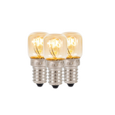 Three small light bulbs with visible filaments on a white background