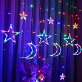 LED lights forming moon and star motifs in a room