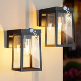 Two outdoor wall lights with motion sensor on a neutral background