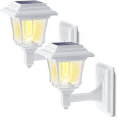 Two solar-powered outdoor wall lights on a white background