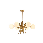 Gold chandelier with glass shades on a white background