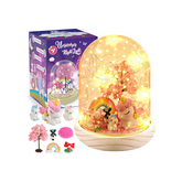 Unicorn night light with packaging and accessories on a white background