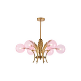 Chandelier with pink glass bulbs and gold metal fixture on a white background