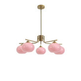 Chandelier with pink glass shades and gold metal structure on a white background