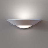 Wall-mounted light fixture on a plain wall