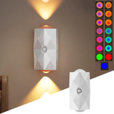 Wall-mounted light fixture with geometric design on a wall, showing color-changing LED lights.