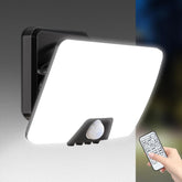 Wall-mounted light fixture with motion sensor and remote control on a gray background