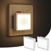 Wall-mounted light switch with illuminated square light fixture and two additional lights on a dark background