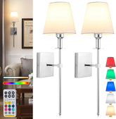 Wall sconces with color-changing lampshades and remote control in a living room setting.