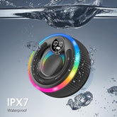 Waterproof speaker with colorful LED lights submerged in water, featuring IPX7 rating.