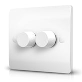White light switch panel with two knobs on a white background