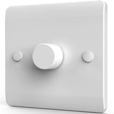 White light switch with three circular knobs on a white background