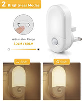 White night light with adjustable brightness modes on a white background