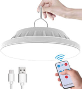 White pendant light with remote control and charging cables on a white background