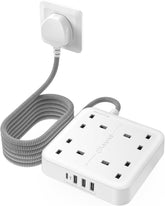 White power strip with multiple sockets and USB ports on a white background