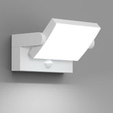 White wall-mounted light fixture with a sensor on a gray background