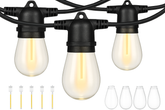 String lights with clear bulbs and black connectors on a white background