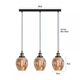 Modern 3-Way Hanging Light illuminating a stylish hallway