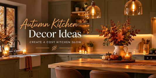 Autumn kitchen decor with warm pendant lighting, under-cabinet lights, autumn foliage and pumpkins