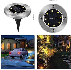 White LED stake light illuminating driveway


