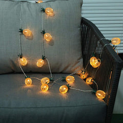 Close-up of copper wire fairy light string

