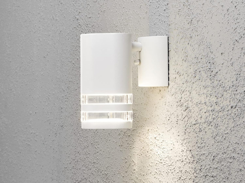 Close-up of the GU10 bulb socket in the white outdoor wall light


