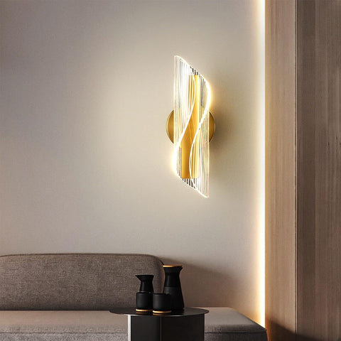 Minimalist spiral LED wall light enhancing a hallway with soft, ambient illumination