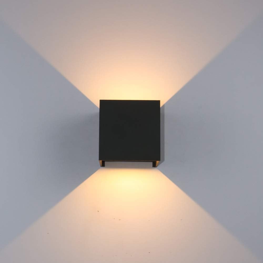 Waterproof LED outdoor wall light with rain droplets, showcasing its durable weather-resistant design