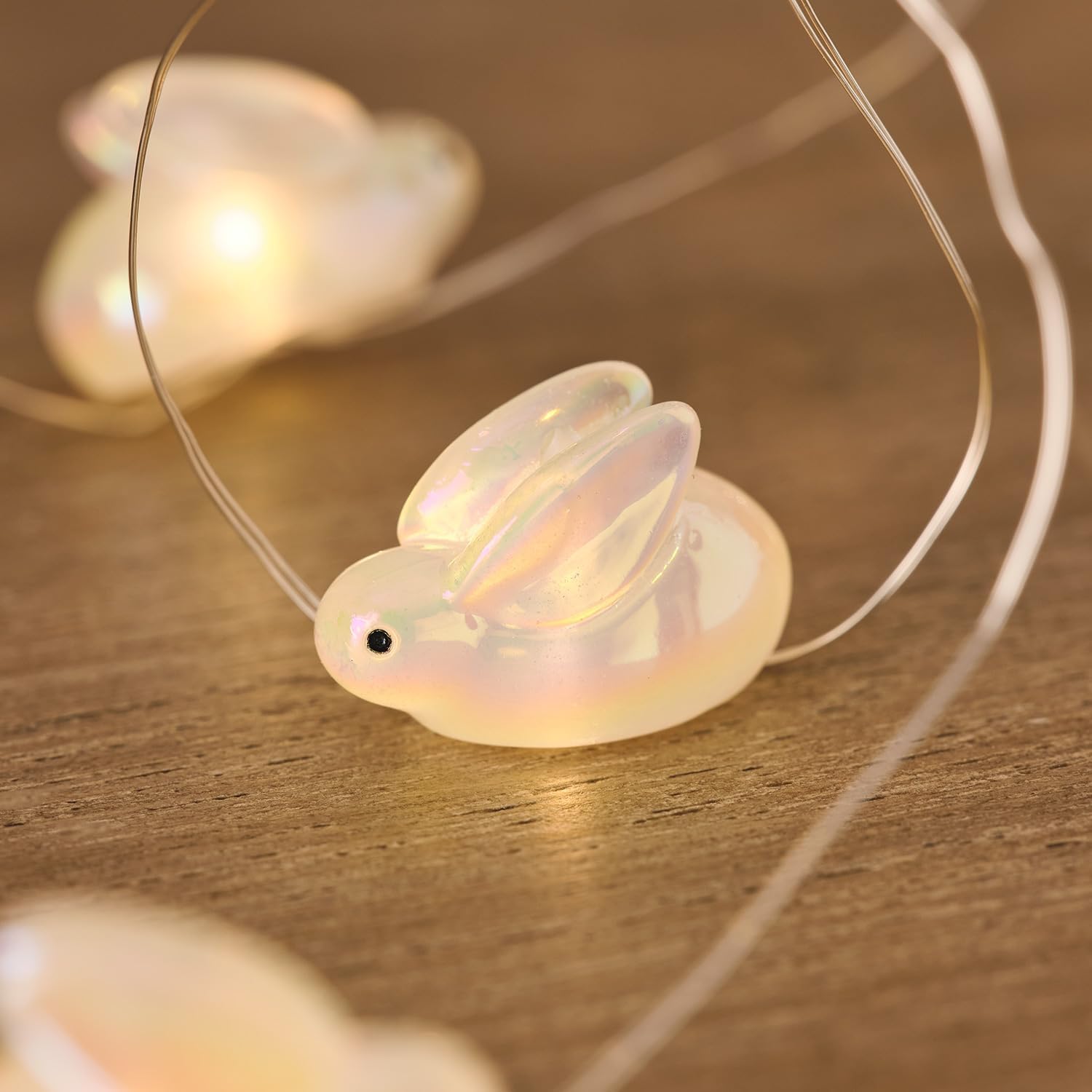 20.5cm glass cloche with warm white bunny LEDs