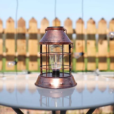 Outdoor hanging lantern with glass and metal build

