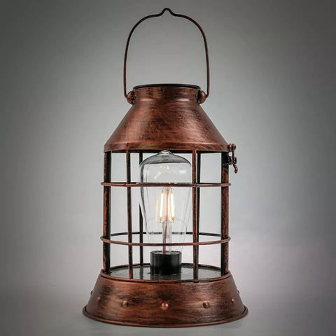 Solar powered tabletop lantern in copper finish

