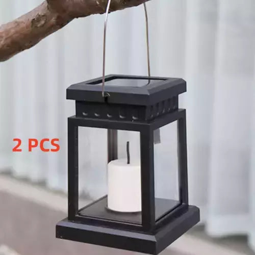 Solar garden lanterns glowing under trees

