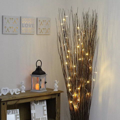 Ambient LED fairy lights draped over a window

