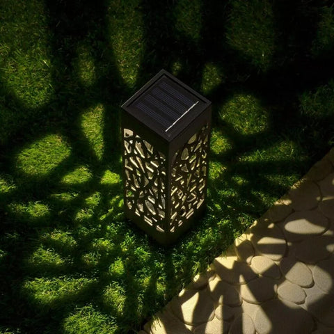 Outdoor lighting set with solar LED garden stake lights


