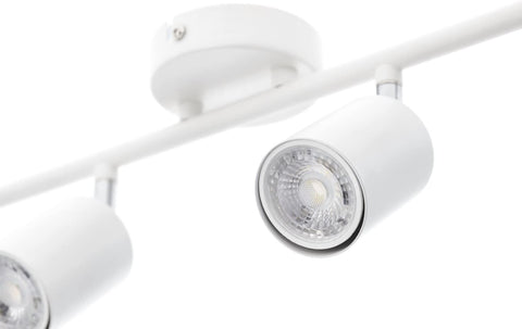 White ceiling light fixture with three circular lights on a white background
