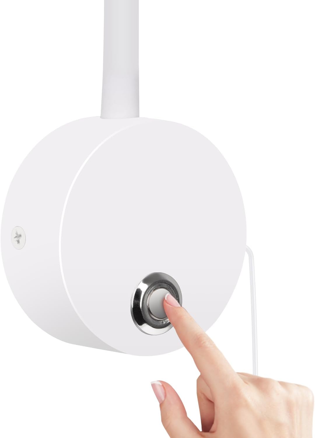 Hand pressing a button on a white cylindrical device with a light gray center against a white background