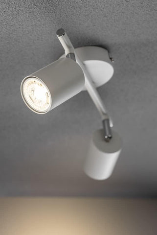 Modern ceiling light fixture on a gray ceiling