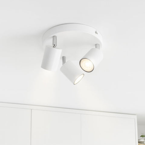 White ceiling light fixture on a white ceiling