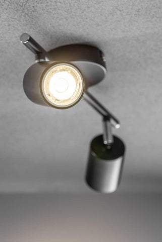 Modern ceiling light fixture with a gray finish on a neutral background