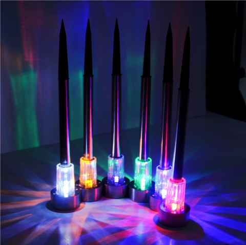 Soft white glow from LED solar stake light

